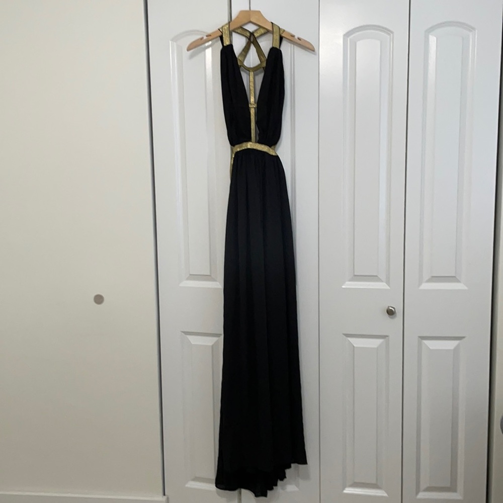 Black & Gold Dress perfect for a special event or prom.brand new.